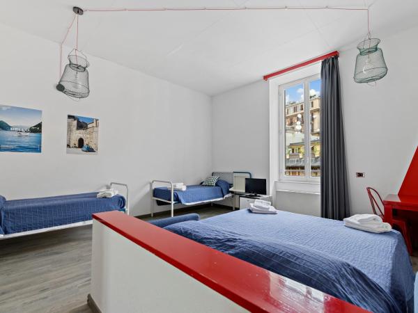 Ostello Bello Genova : photo 1 de la chambre chambre quadruple avec salle de bains privative