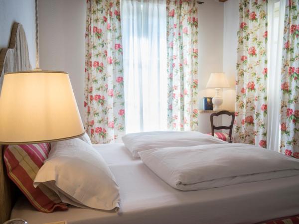 La Vineria di San Mattia : photo 5 de la chambre chambre double ou lits jumeaux supérieure - vue sur jardin