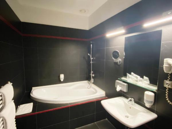 Boutique Hotel Sopianae : photo 6 de la chambre chambre deluxe