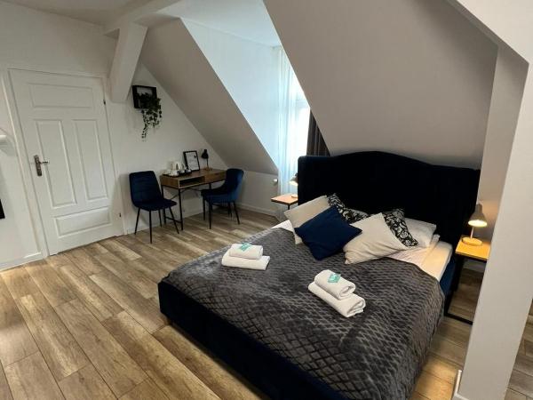 Great Polonia Wrocław Tumski : photo 4 de la chambre suite supérieure lit king-size