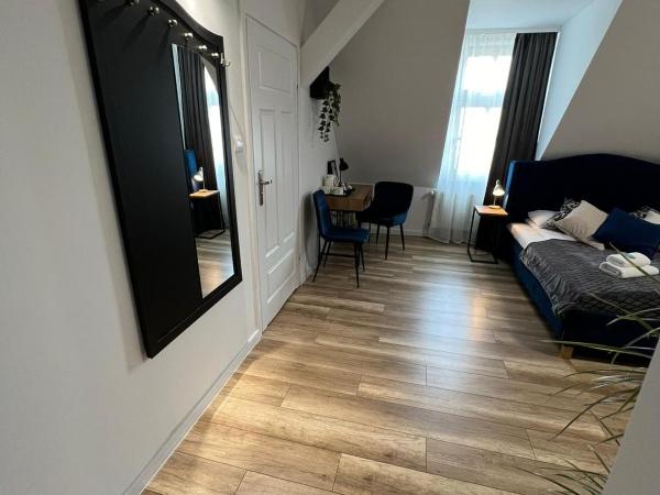 Great Polonia Wrocław Tumski : photo 9 de la chambre suite supérieure lit king-size