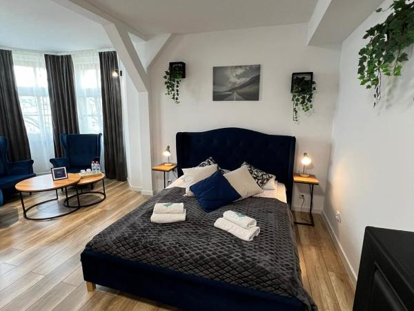 Great Polonia Wrocław Tumski : photo 10 de la chambre suite supérieure lit king-size