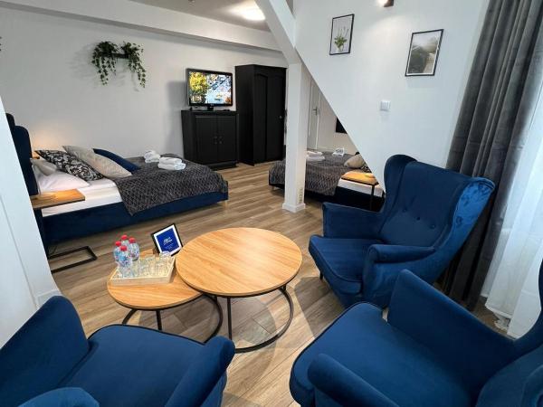 Great Polonia Wrocław Tumski : photo 1 de la chambre suite supérieure lit king-size