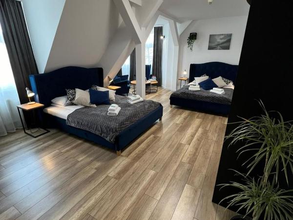 Great Polonia Wrocław Tumski : photo 6 de la chambre suite supérieure lit king-size