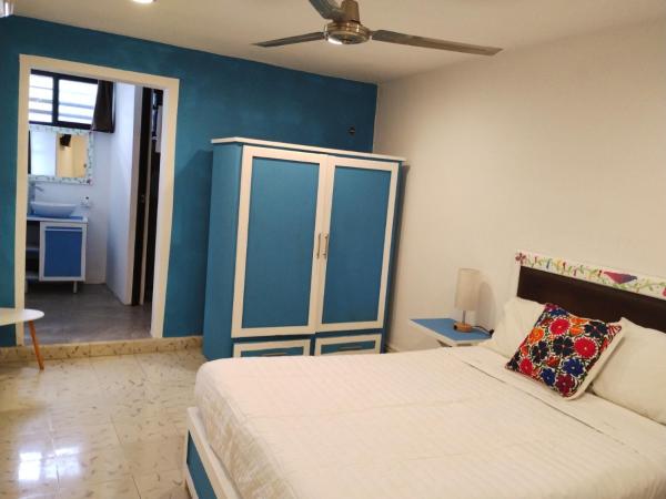 T´úubul K´iin Bed & Breakfast : photo 3 de la chambre chambre double