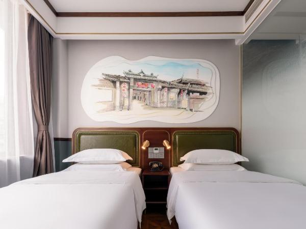 Time Traveller Boutique Hotel -Near Chengdu Wide narrow lane, People's Park, Chengdu Panda Base, 10 minutes walk to subway , Eat chaffy dish, Free night snack, Free laundry, English communication well, Free travel advice : photo 3 de la chambre chambre lits jumeaux supérieure