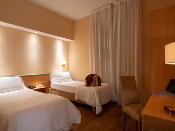 Hotel Iris : photo 1 de la chambre chambre double ou lits jumeaux