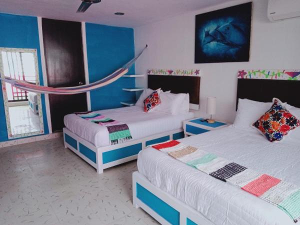 T´úubul K´iin Bed & Breakfast : photo 5 de la chambre chambre lits jumeaux