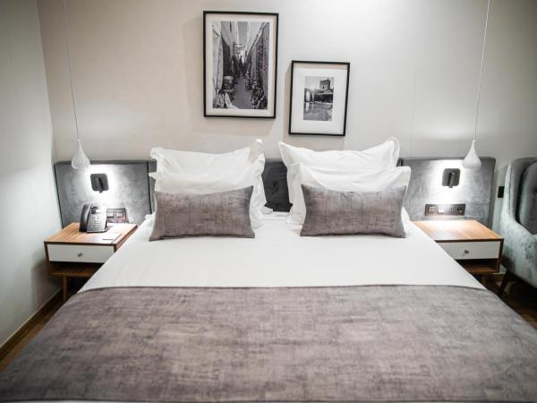 Dominium Palace : photo 3 de la chambre chambre deluxe - vue partielle sur mer