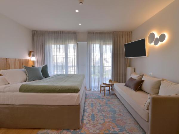 Mirivili Rooms & Suites : photo 2 de la chambre suite exécutive