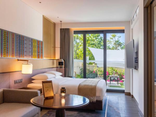 Hyatt Regency Sanya Tianli Bay : photo 2 de la chambre chambre lit king-size avec cour