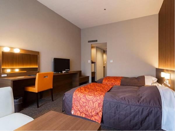 Maple Arima : photo 3 de la chambre chambre lits jumeaux avec salle de bains commune