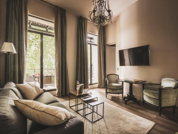 Les Lodges Sainte-Victoire Hotel & Spa : photo 4 de la chambre suite saint-estève avec accès gratuit au spa