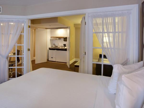 Hôtel Le Cantlie Suites : photo 6 de la chambre suite exécutive avec 2 lits doubles