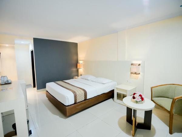 Cakra Kusuma Hotel : photo 3 de la chambre chambre lit queen-size deluxe