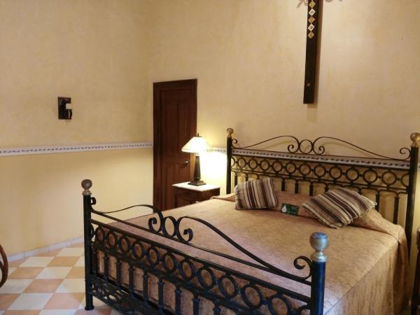 Hotel Boutique La Mision De Fray Diego : photo 7 de la chambre deluxe suite 1 double bed & garden view