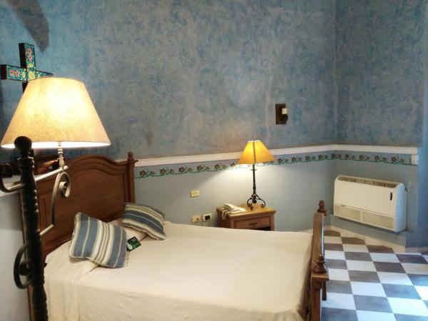 Hotel Boutique La Mision De Fray Diego : photo 3 de la chambre deluxe suite 1 double bed & garden view