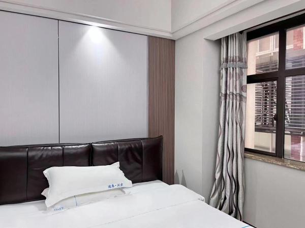 广州沃家国际公寓 : photo 6 de la chambre studio