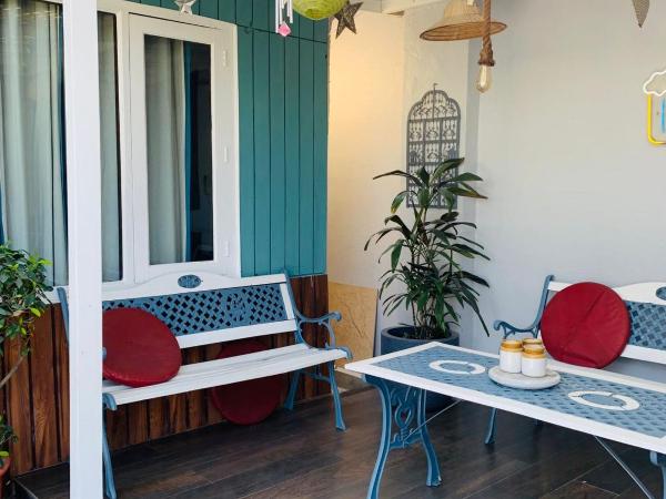 Vandana's Bed and breakfast : photo 4 de la chambre chambre double deluxe - vue sur jardin