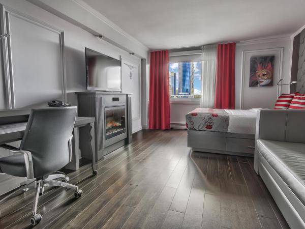 Hotel Plaza Quebec : photo 2 de la chambre chambre signature avec cheminée, douche en verre, 1 lit queen-size et 1 lit escamotable queen-size - vue sur extérieur