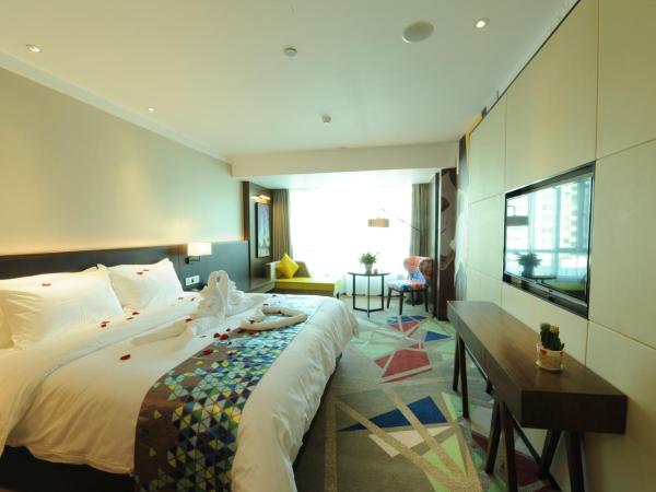 Chao Man Hotel - Guangzhou Railway Station Sanyuanli Metro Station : photo 2 de la chambre chambre supérieure lit queen-size