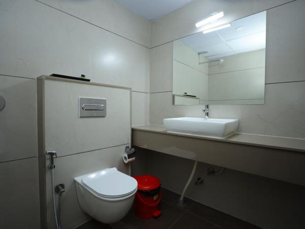 Silverkey Hotel Yelahanka : photo 7 de la chambre chambre double ou lits jumeaux