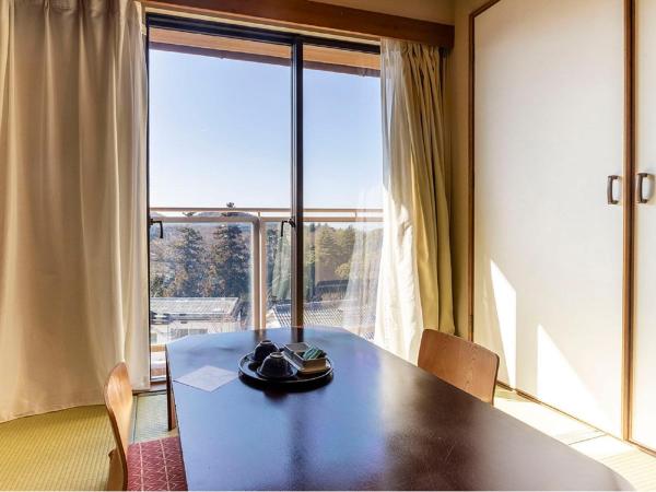 Maple Arima : photo 4 de la chambre chambre lits jumeaux avec salle de bains commune