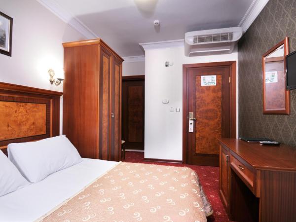 Grand Eyuboglu Hotel : photo 2 de la chambre chambre double ou lits jumeaux