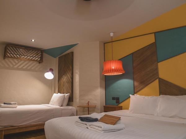 Gategaa Village : photo 1 de la chambre chambre triple deluxe