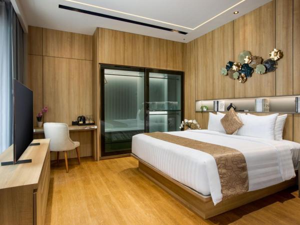 Kinaralana Hotel Yogyakarta : photo 5 de la chambre suite lit queen-size