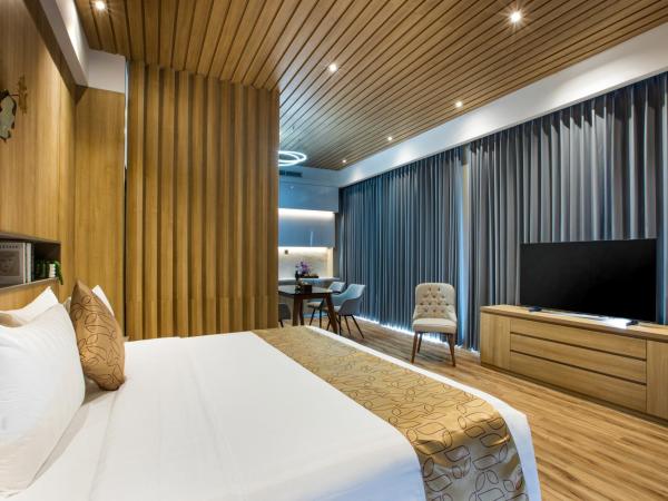 Kinaralana Hotel Yogyakarta : photo 2 de la chambre suite lit queen-size