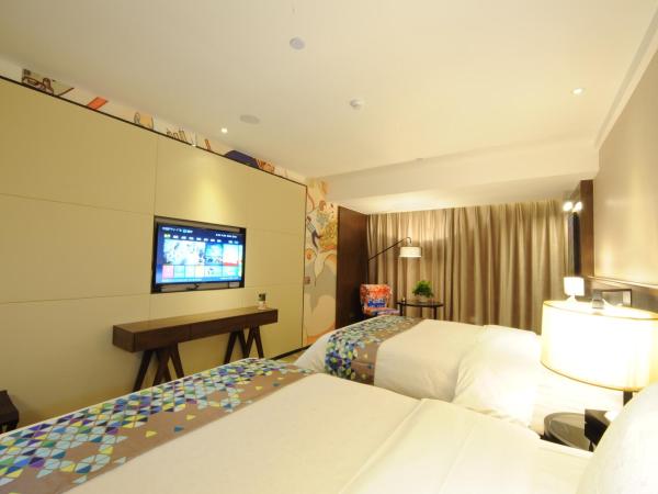 Chao Man Hotel - Guangzhou Railway Station Sanyuanli Metro Station : photo 1 de la chambre chambre lits jumeaux supérieure