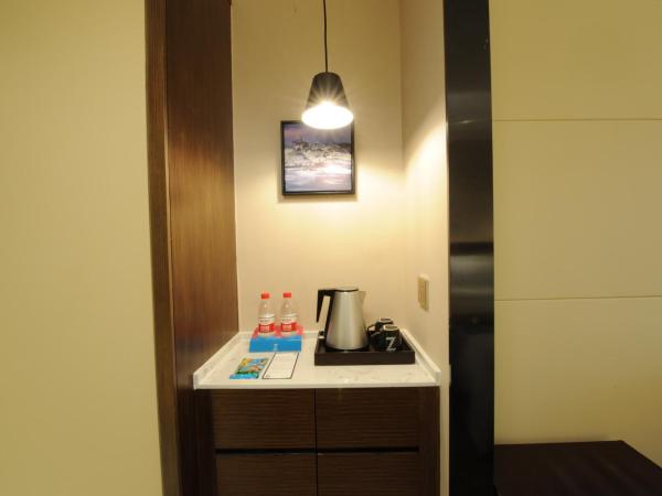 Chao Man Hotel - Guangzhou Railway Station Sanyuanli Metro Station : photo 5 de la chambre chambre lits jumeaux supérieure