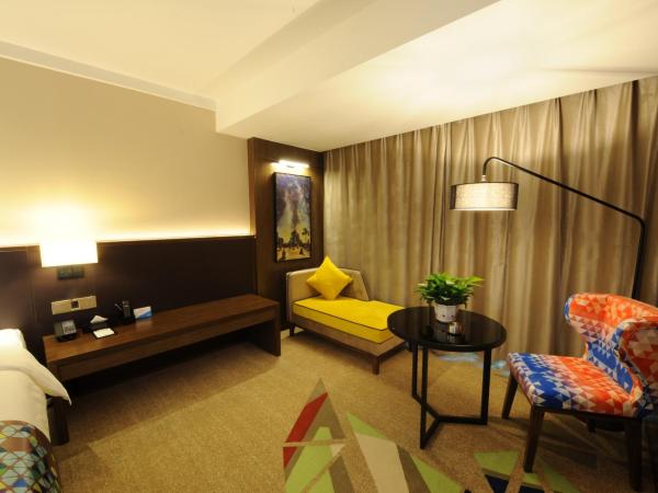 Chao Man Hotel - Guangzhou Railway Station Sanyuanli Metro Station : photo 5 de la chambre chambre lit queen-size deluxe