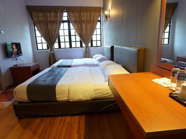 Zen Zeng Hotel : photo 2 de la chambre chambre familiale suite