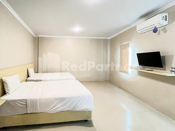 Hotel Andono near YIA Mitra RedDoorz : photo 3 de la chambre chambre lits jumeaux deluxe