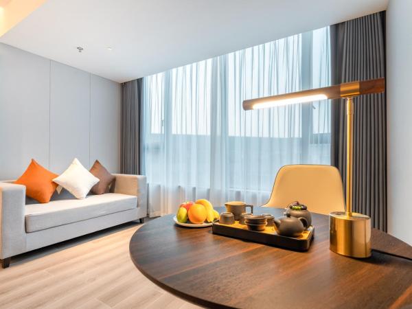 The Puyan Hotel Hangzhou Jiubao : photo 2 de la chambre chambre lits jumeaux supérieure