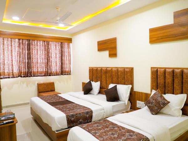 Hotel The Grand : photo 2 de la chambre chambre triple