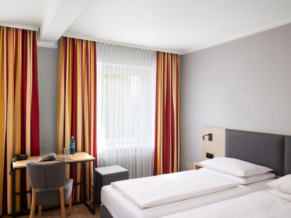Hotel Central Hamburg : photo 4 de la chambre chambre triple