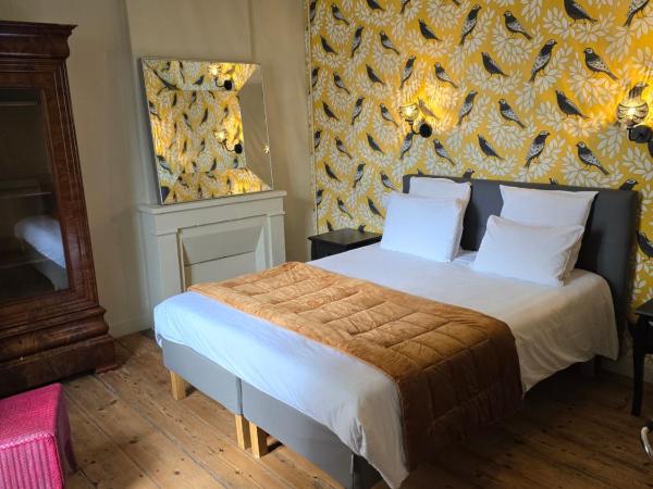 Au Loup Historic Apartments : photo 2 de la chambre appartement 4