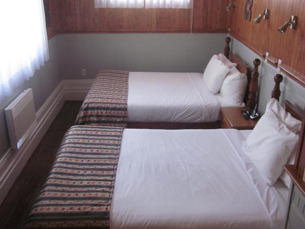 Hôtel Manoir de l'Esplanade : photo 3 de la chambre suite de luxe avec 2 lits queen-size