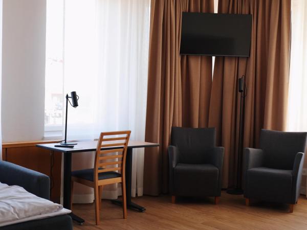 Hesehotelli Turku Linja-autoasema : photo 6 de la chambre grande chambre quadruple