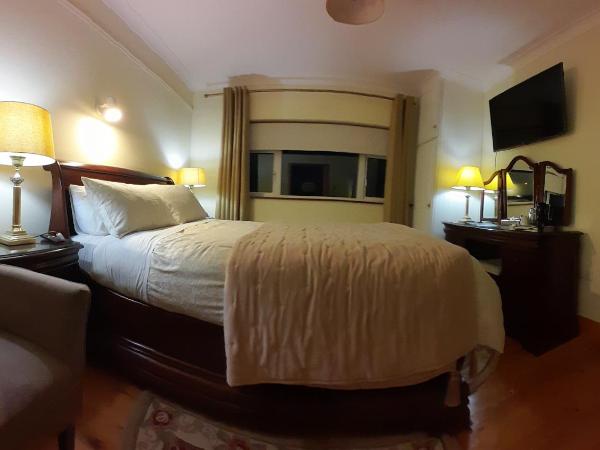 Woodhaven Manor h91rc9d : photo 3 de la chambre chambre lit king-size supérieure