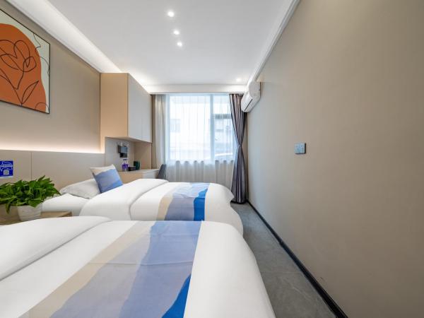 Yozo Serviced Apartment : photo 4 de la chambre chambre lits jumeaux avec salle de bains privative