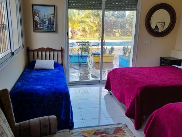 Riad TANJIL : photo 3 de la chambre chambre familiale avec salle de bains privative