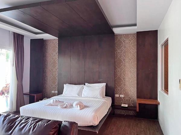 Phi Phi Cliff Beach Resort : photo 1 de la chambre chambre double de luxe avec piscine - front de mer