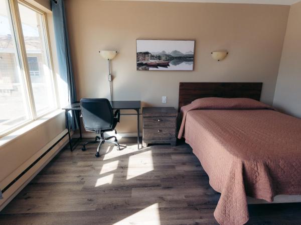 Clarkson Village Motel : photo 2 de la chambre chambre lit queen-size