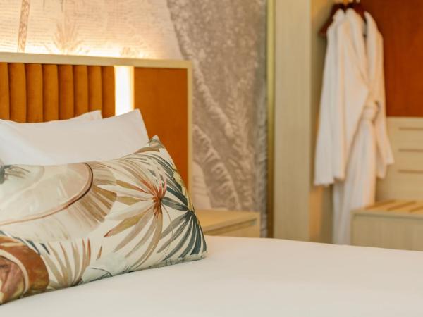 Amora Hotel Brisbane : photo 6 de la chambre amora balcony suite with complimentary minibar and free wi-fi