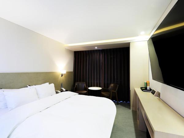 CS Avenue Tourist Hotel : photo 1 de la chambre chambre double