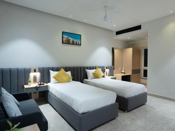 Hotel Kyzen Hi Tech City : photo 2 de la chambre chambre lit king-size